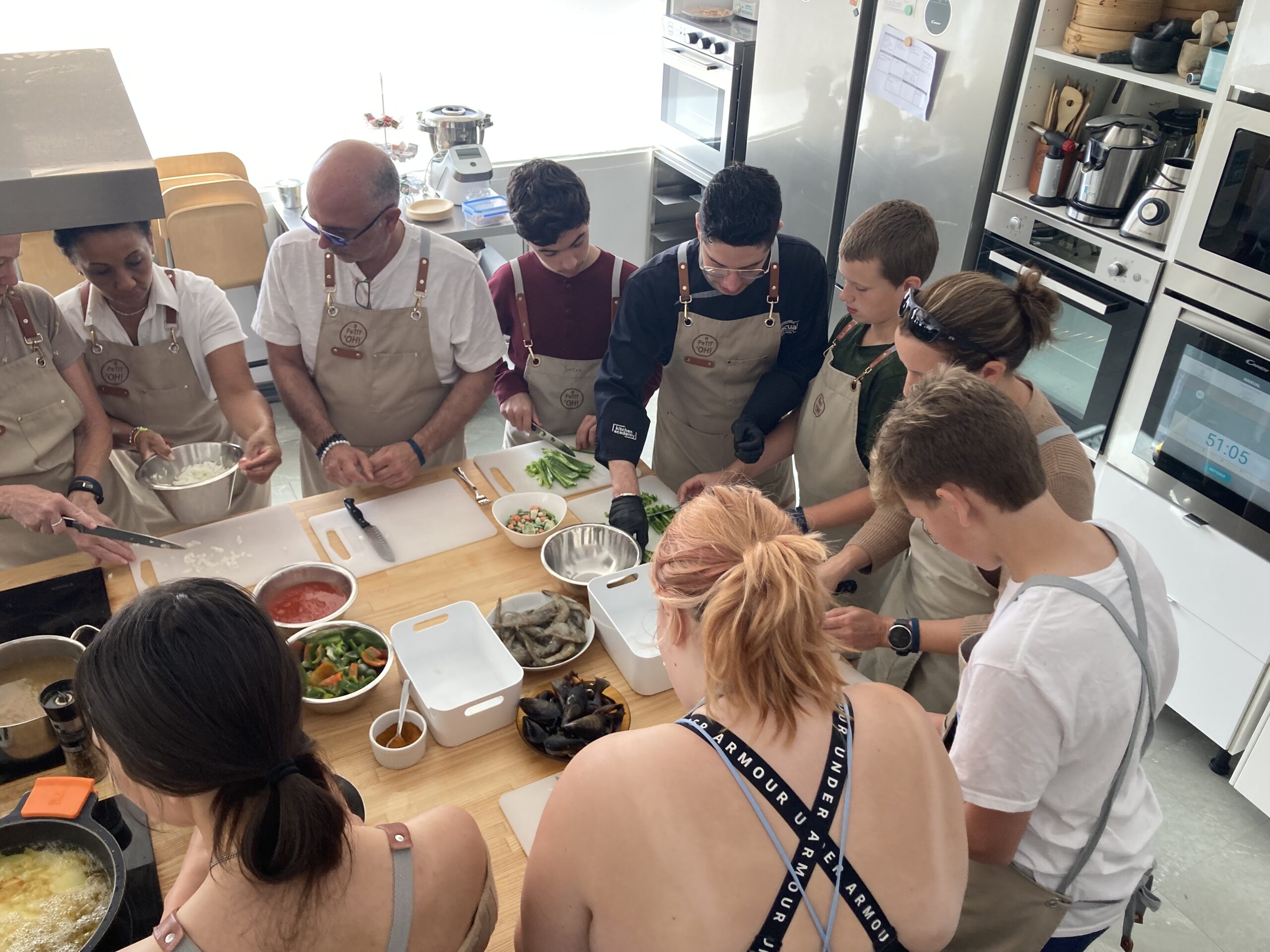 Ivy Languages students in an immersive cooking class during a language learning trip