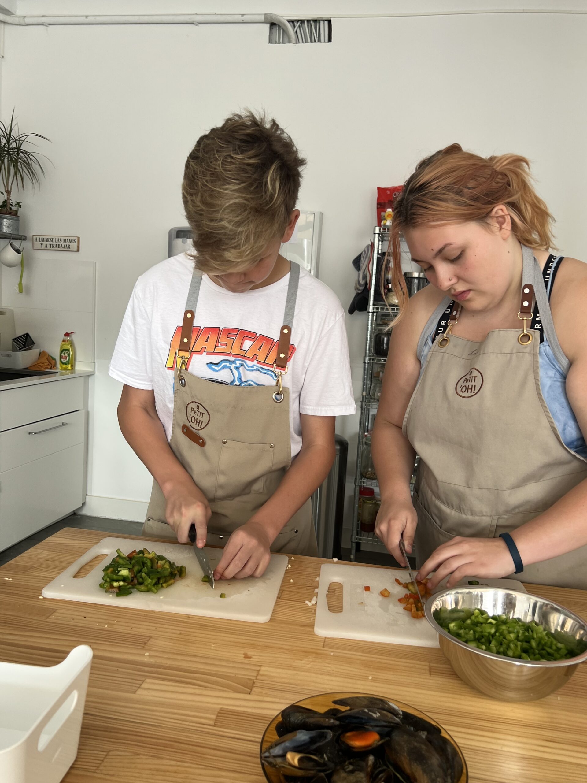 Ivy Languages students learning to cook during an immersive language and cultural experience trip