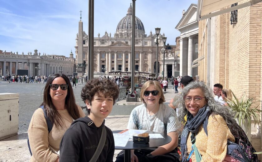 Ivy Languages students enjoying a cafe in Rome with St Peters Basilica in background