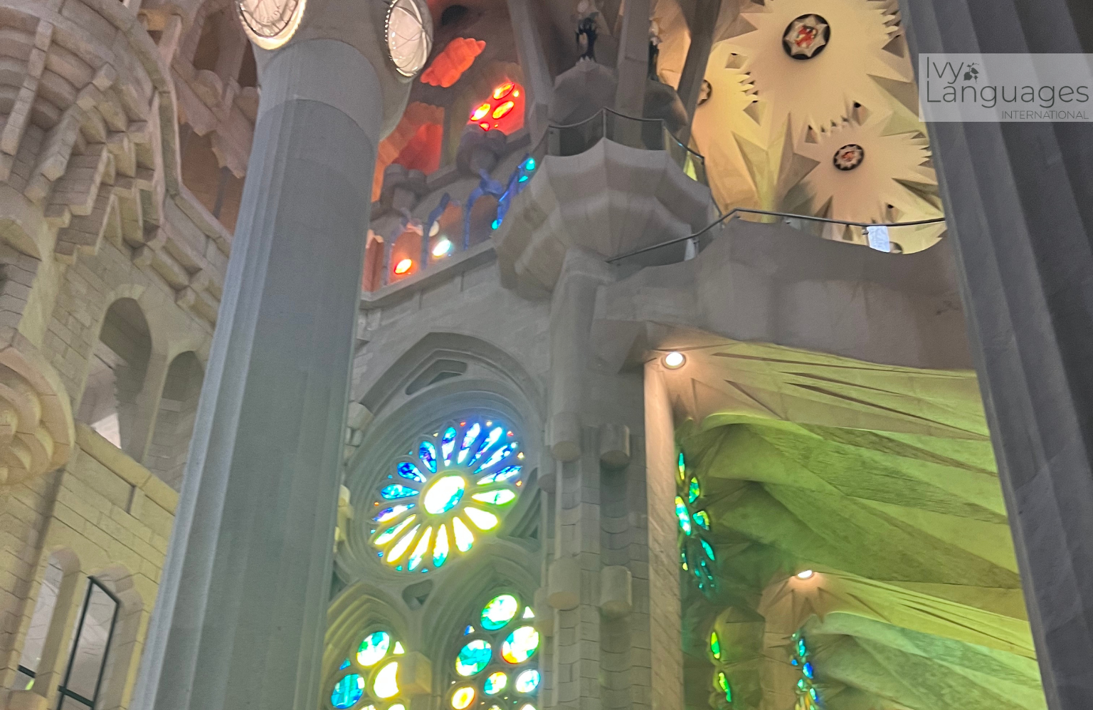 Mastering basic English grammar rules inside a cathedral with colorful stained glass and visitors