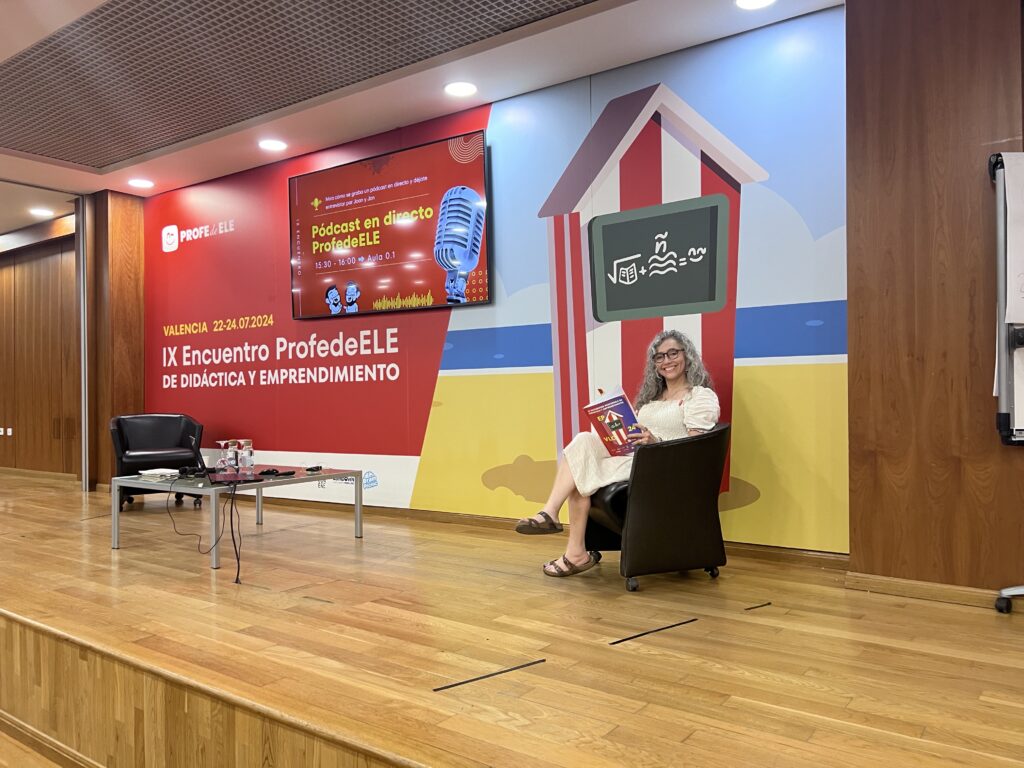 Mastering basic English grammar rules at a language conference with a speaker on stage