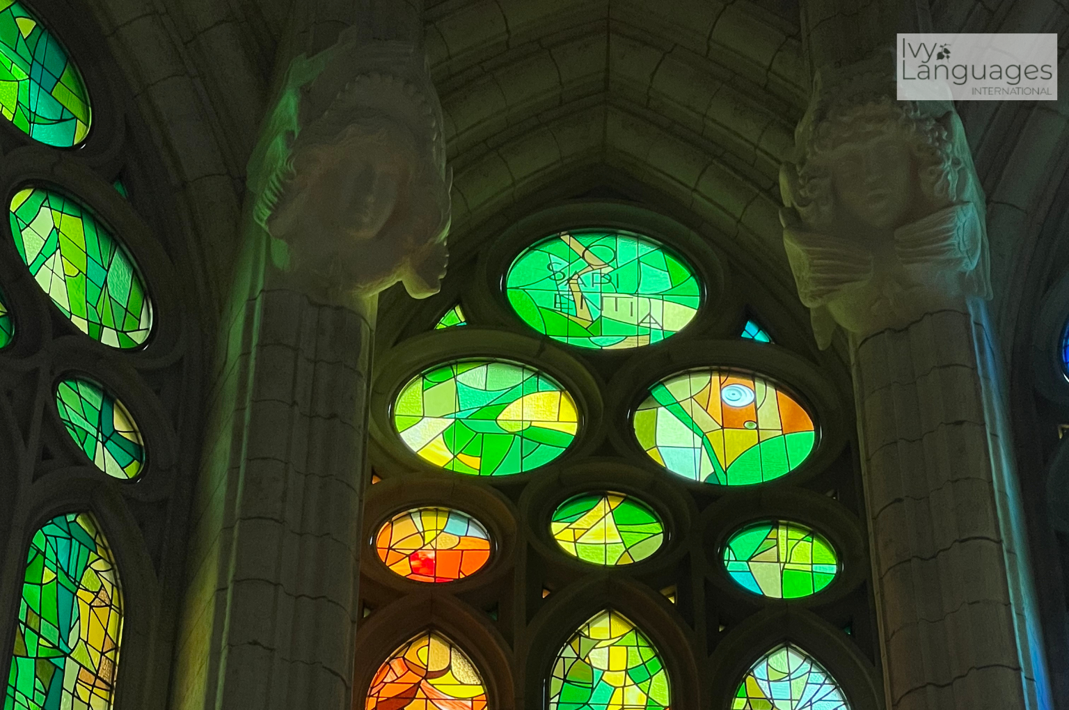 Overcoming Fear of Speaking English reflected through colorful stained glass in a quiet, reflective space