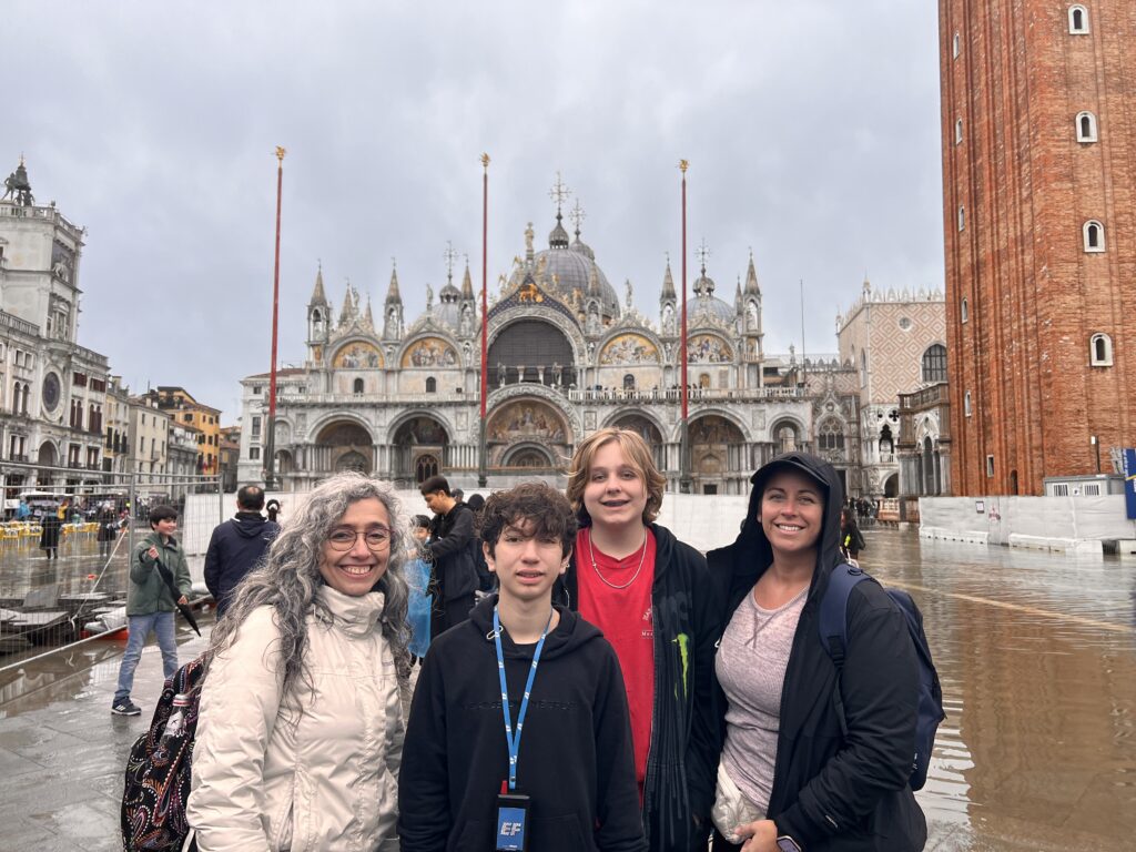 Group in front of landmark showing common mistakes English beginners make while speaking in real situations