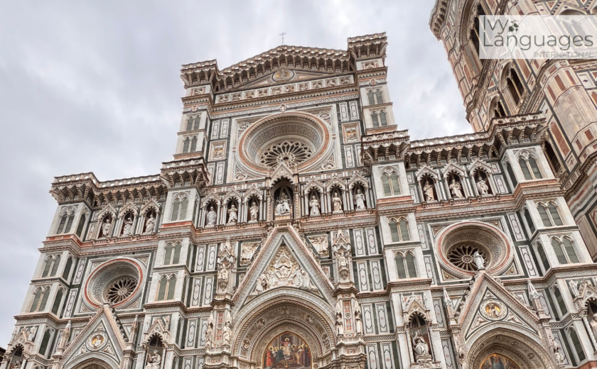 Group using simple English conversation topics while visiting a historic cathedral