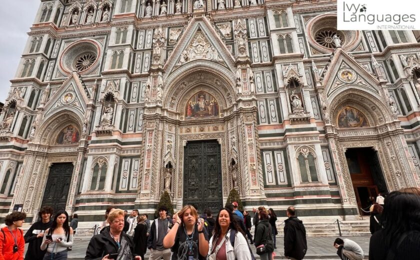 Ivy Languages students building professional English vocabulary and business communication skills at Florence Cathedral facade 