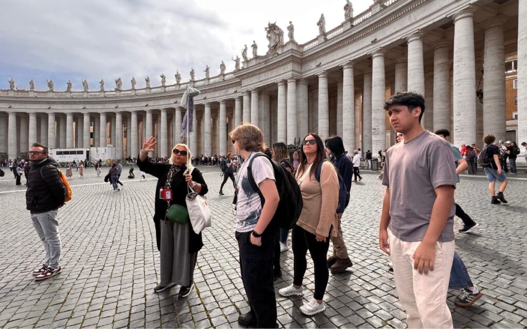 English language mastery through real-world language immersion, guided group tour at Vatican's St. Peter's Square colonnades