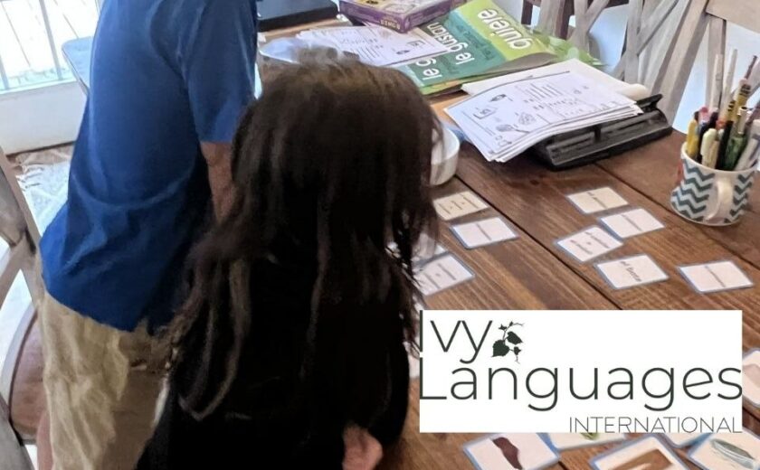 Children using reading materials for intermediate level during a vocabulary learning activity