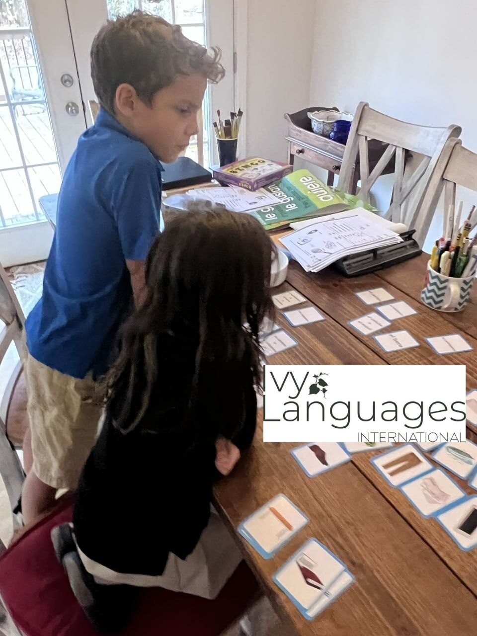 Children using reading materials for intermediate level during a vocabulary learning activity