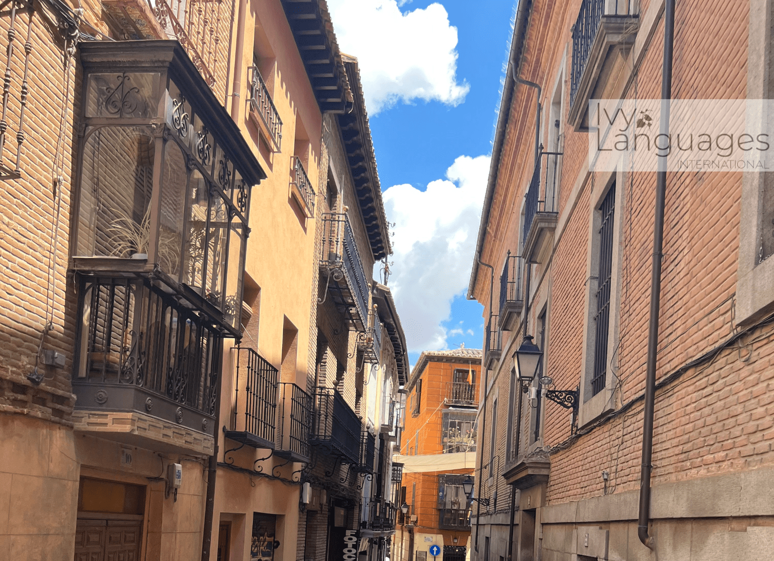 Students exploring historic streets while reading advanced english literature online