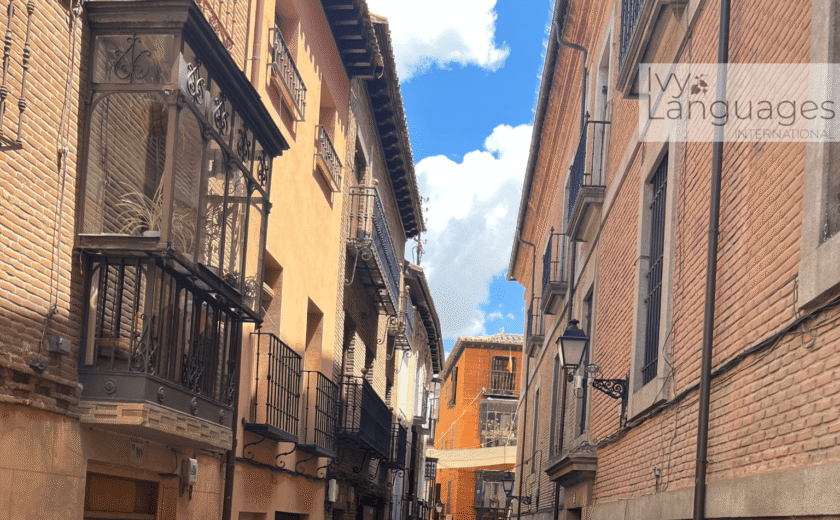 Students exploring historic streets while reading advanced english literature online 