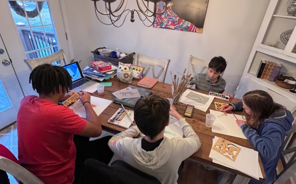 Students developing listening comprehension exercises and contextual listening skills through creative immersive home activities 